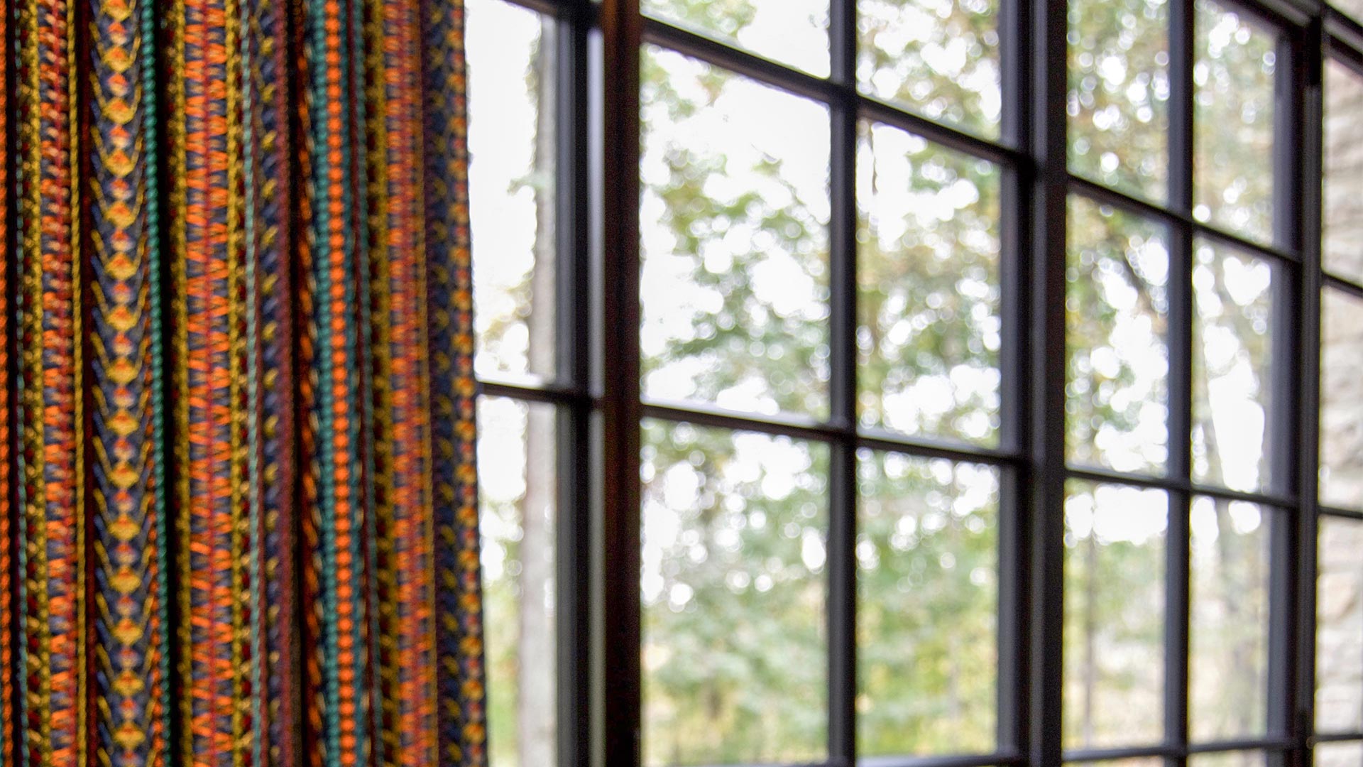 Steel glazed windows with curtains