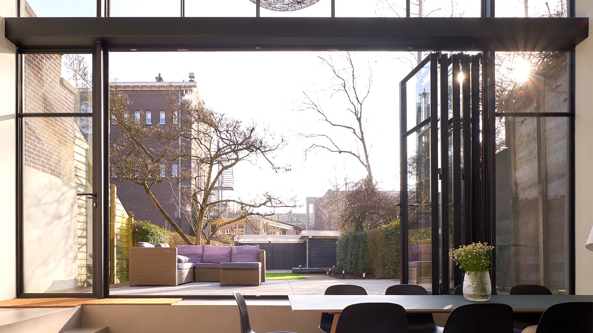Looking outside in Rotterdam, The netherlands through open MHB folding door