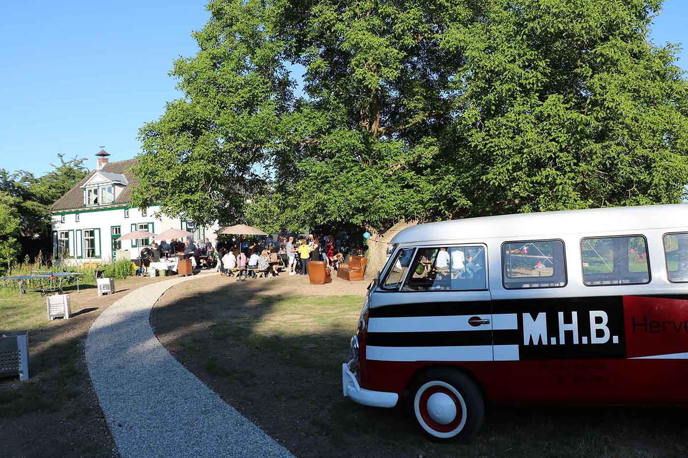 A summer bbq festival for MHB employees with the MHB van